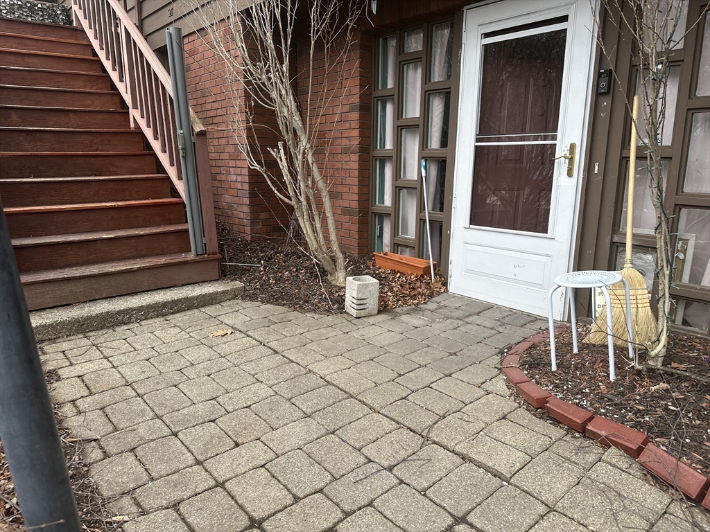 101 Hackensack Road Boston, MA 02467 - Photo 3 of 33 a view of a dinning room with entryway