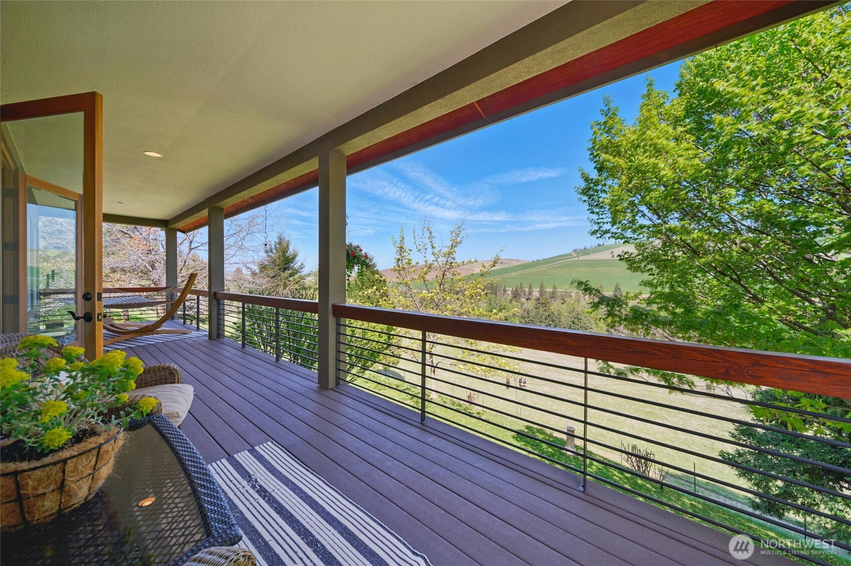469 Tag Lane Walla Walla, WA 99362 - Photo 2 of 40 a view of a balcony with wooden floor