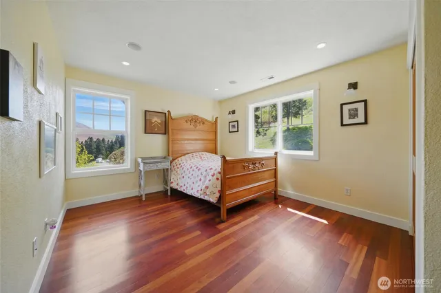 a room with a bed and a window