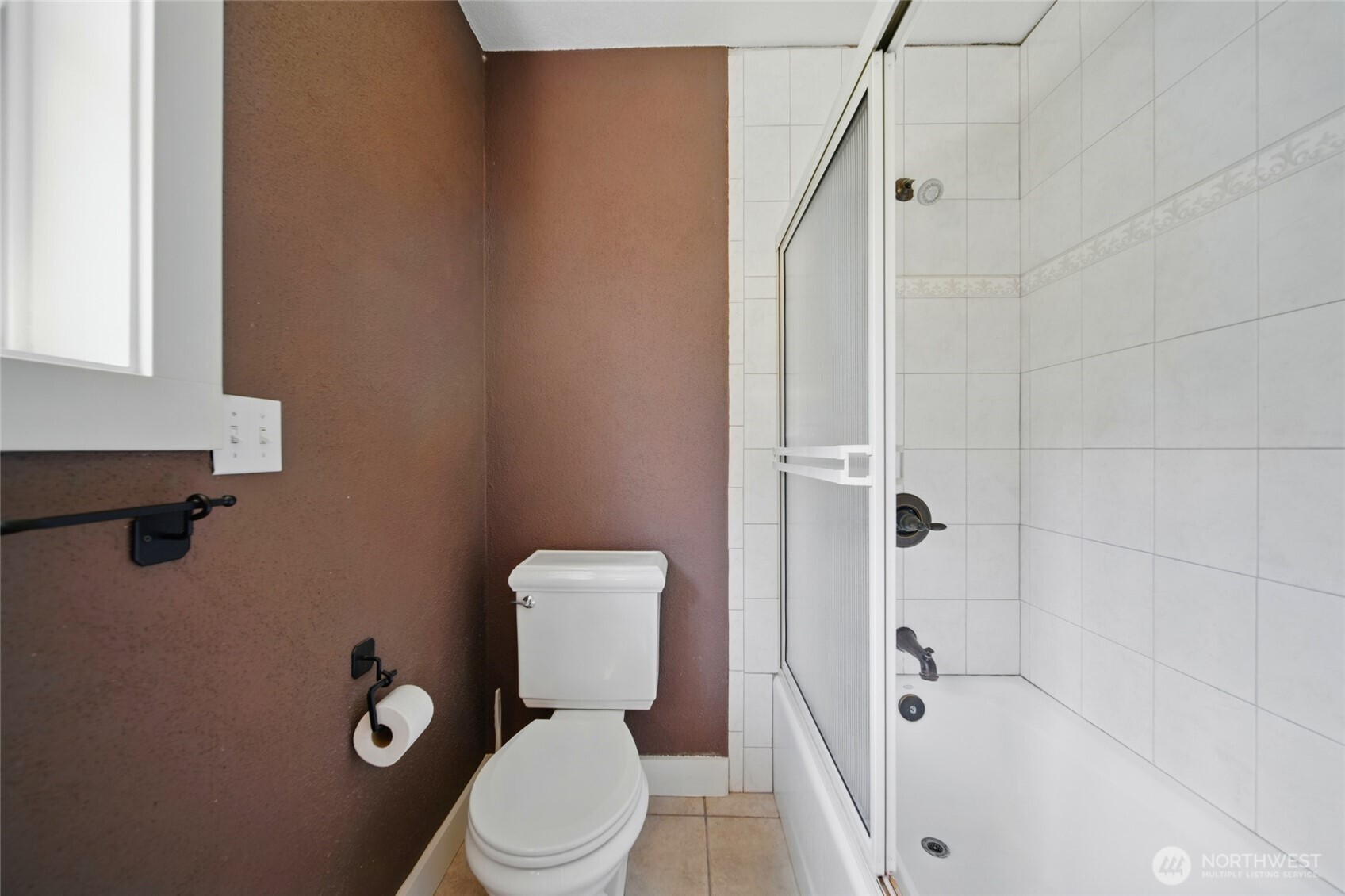 469 Tag Lane Walla Walla, WA 99362 - Photo 24 of 40 a white toilet sitting next to a bath tub