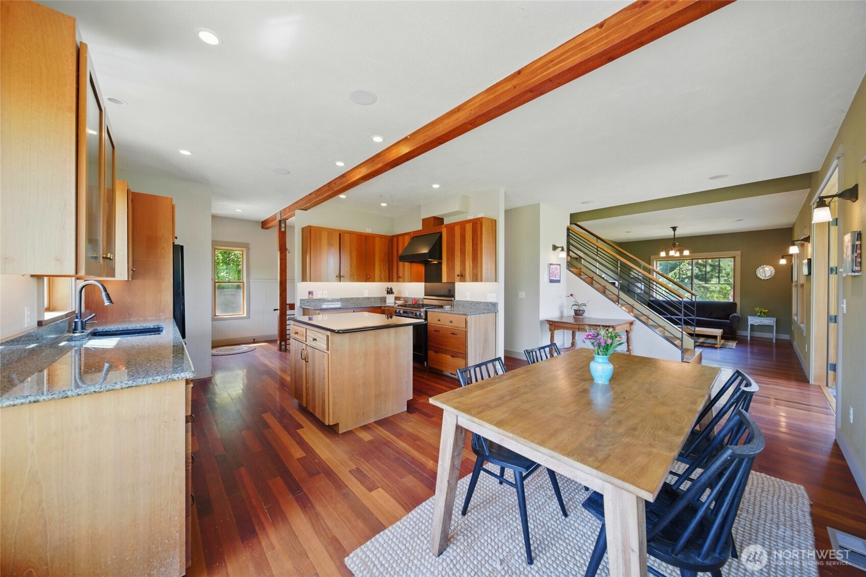 469 Tag Lane Walla Walla, WA 99362 - Photo 9 of 40 a kitchen with a table chairs and wooden floor