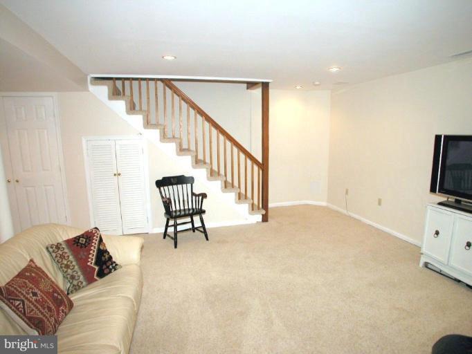 316 Murdock Road Baltimore, MD 21212 - Photo 12 of 25 a living room with furniture and a flat screen tv