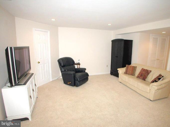 316 Murdock Road Baltimore, MD 21212 - Photo 13 of 25 a living room with furniture and a flat screen tv