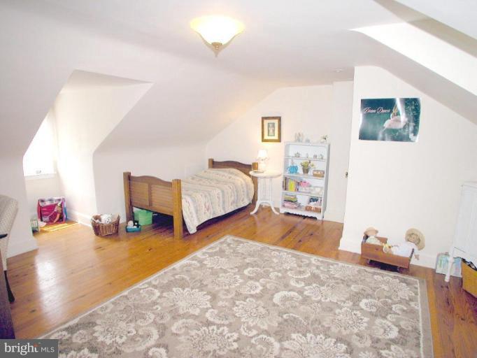 316 Murdock Road Baltimore, MD 21212 - Photo 20 of 25 a bedroom with bed and window