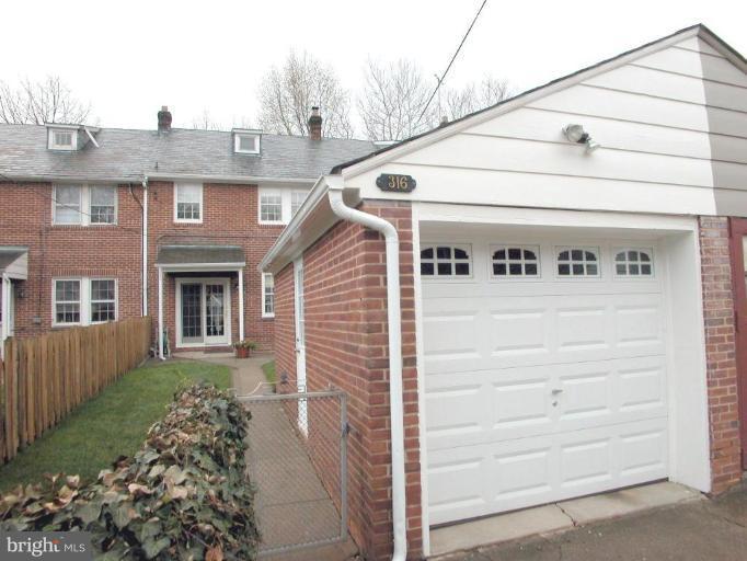 316 Murdock Road Baltimore, MD 21212 - Photo 24 of 25 a front view of a house with a garage