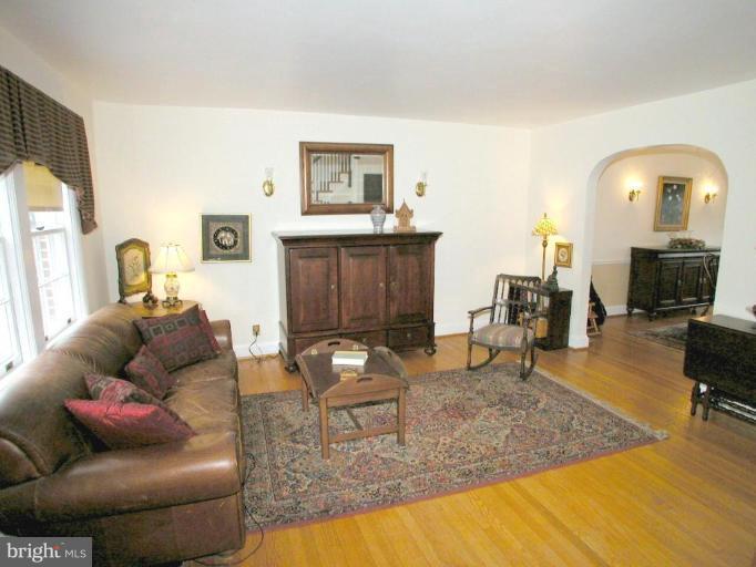 316 Murdock Road Baltimore, MD 21212 - Photo 5 of 25 a living room with furniture and a fireplace