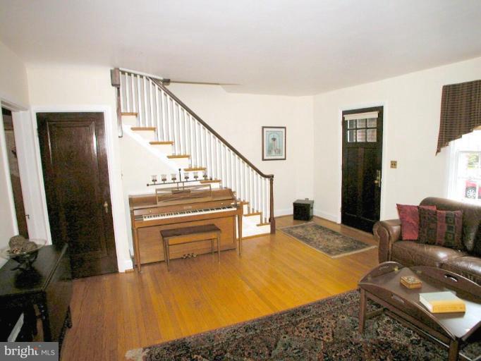 316 Murdock Road Baltimore, MD 21212 - Photo 6 of 25 a living room with furniture and a flat screen tv