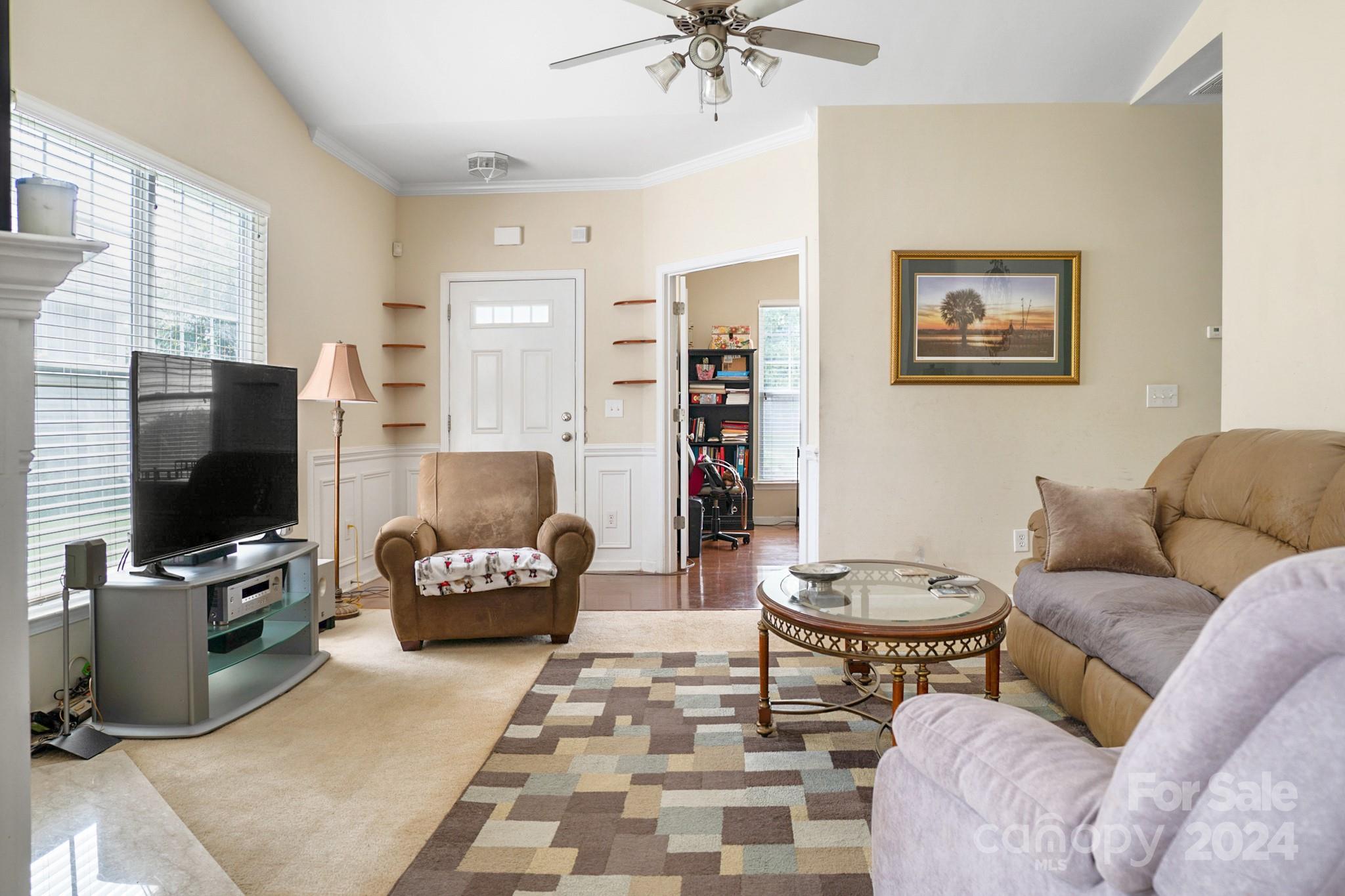 508 Marblewood Court Fort Mill, SC 29708 - Photo 6 of 21 a living room with furniture and a flat screen tv
