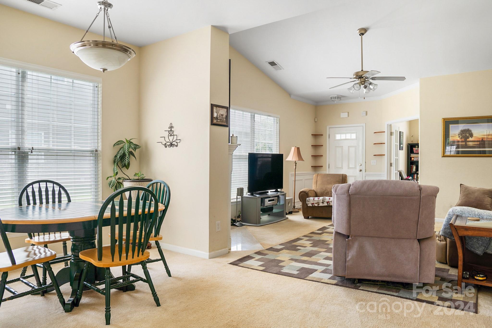 508 Marblewood Court Fort Mill, SC 29708 - Photo 7 of 21 a living room with furniture and a flat screen tv