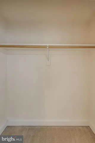 a view of house with backyard porch and seating