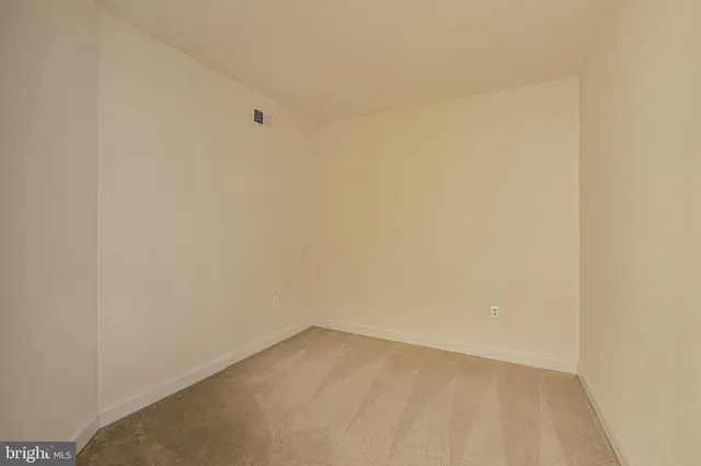 a view of a room with lots of windows