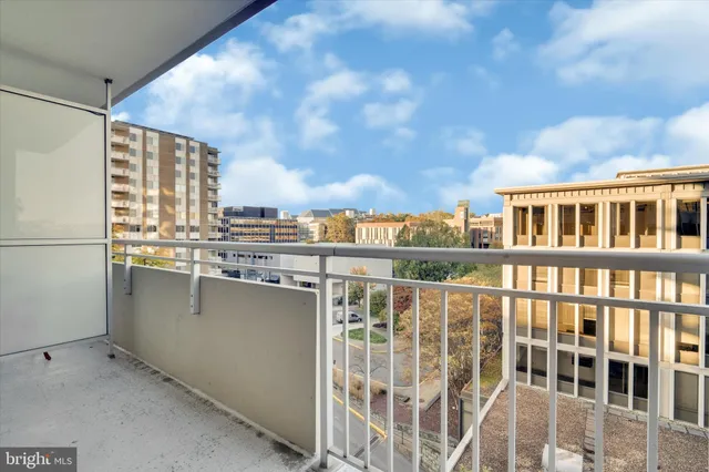 a view of a balcony with city view