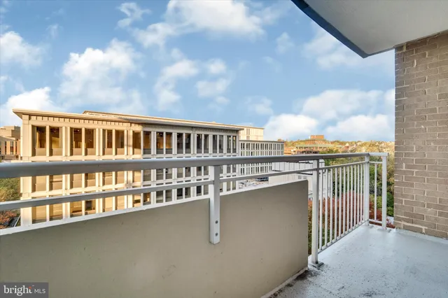 a view of a balcony with city view