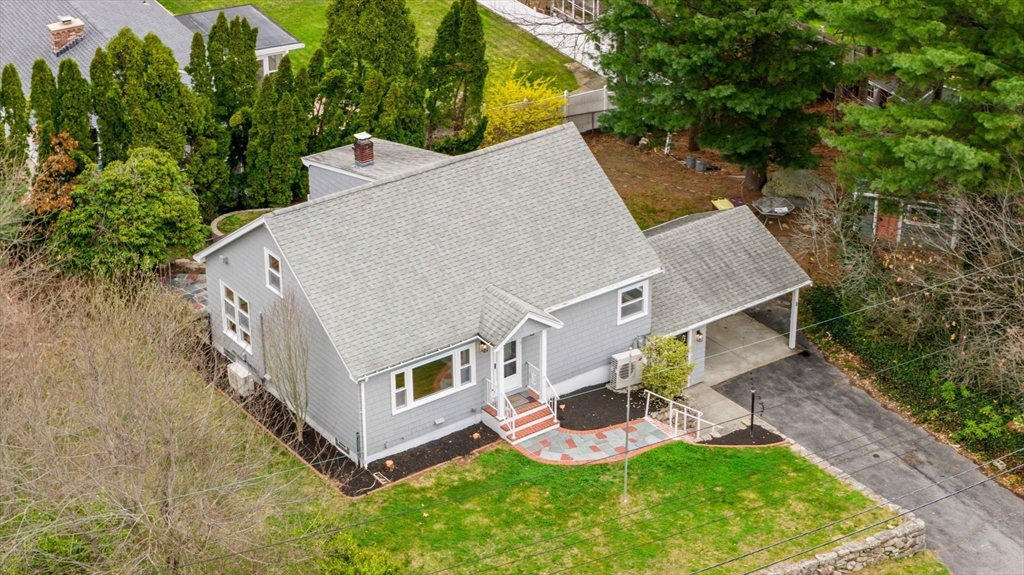 9 Burt Street Acushnet, MA 02743 - Photo 2 of 29 an aerial view of a house with swimming pool next to a yard