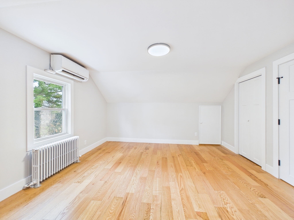 9 Burt Street Acushnet, MA 02743 - Photo 23 of 29 a view of a room with wooden floor and windows