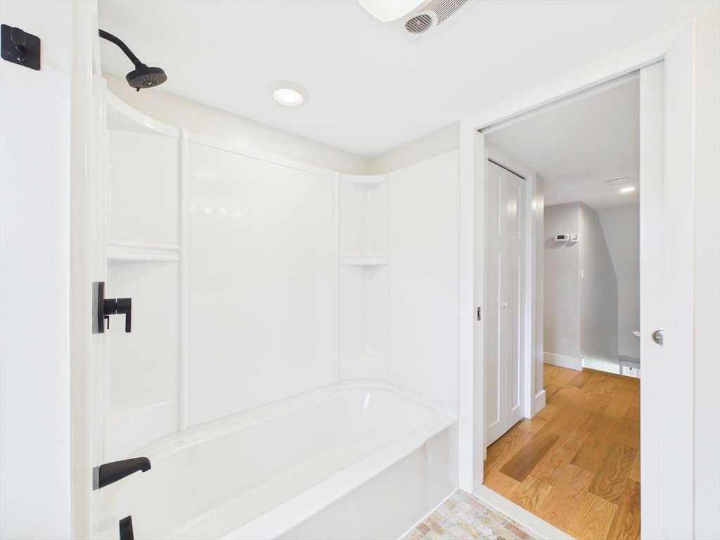9 Burt Street Acushnet, MA 02743 - Photo 25 of 29 a bathroom with a bathtub and a shower