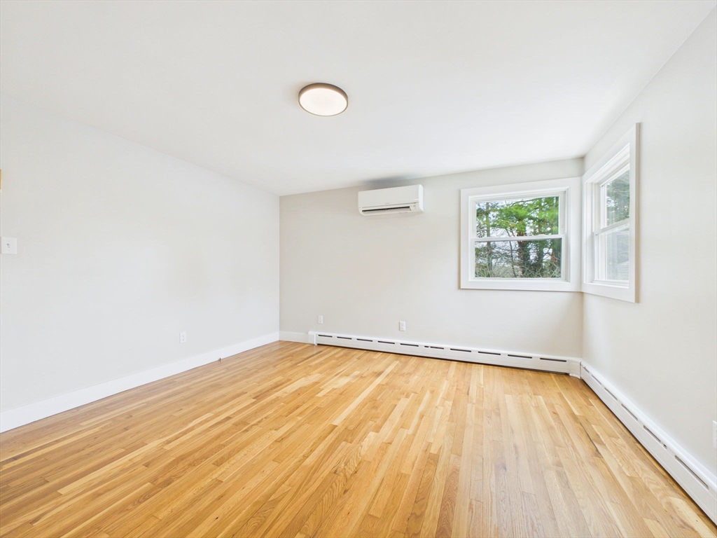 9 Burt Street Acushnet, MA 02743 - Photo 26 of 29 a view of a room with wooden floor and white walls