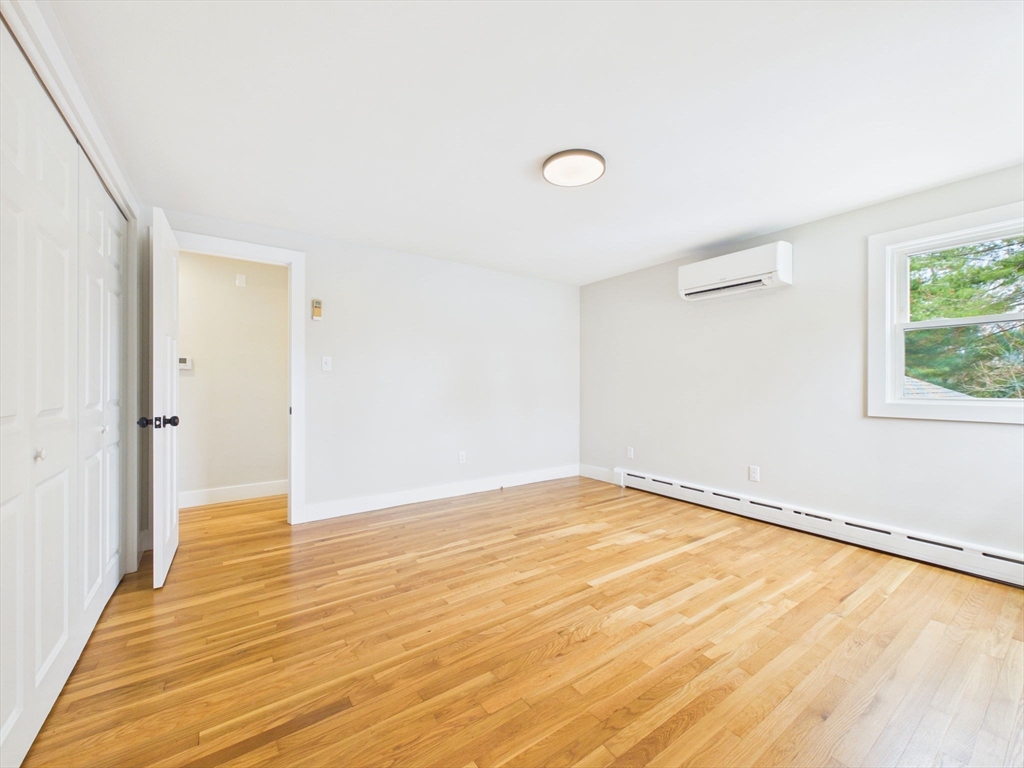 9 Burt Street Acushnet, MA 02743 - Photo 28 of 29 a view of an empty room with wooden floor and a window