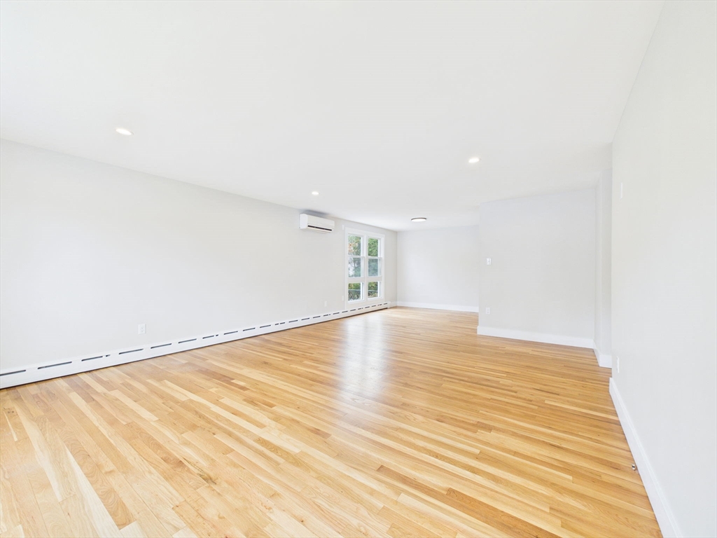 9 Burt Street Acushnet, MA 02743 - Photo 29 of 29 a view of empty room with wooden floor
