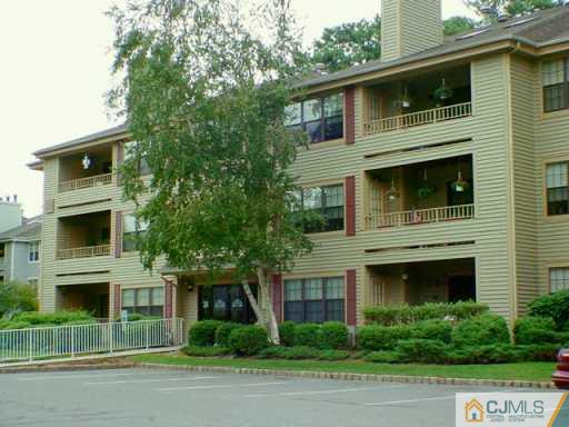 2810 Ridgefield Court Helmetta, NJ 08828 - Photo 6 of 8 a view of a house with a balcony
