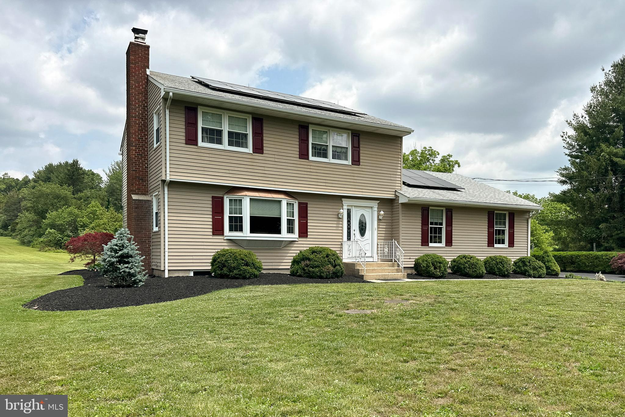 56 Valley Road Lambertville, NJ 08530 - Photo 14 of 49 a front view of a house with garden