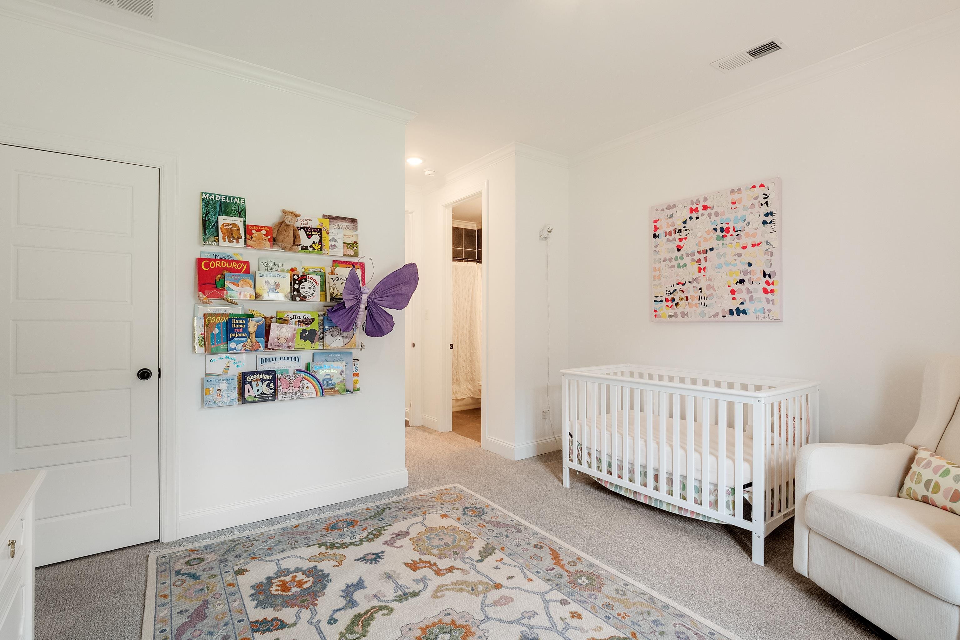 964 Collierville Arlington Road Collierville, TN 38017 - Photo 22 of 40 a bedroom with furniture and a rug