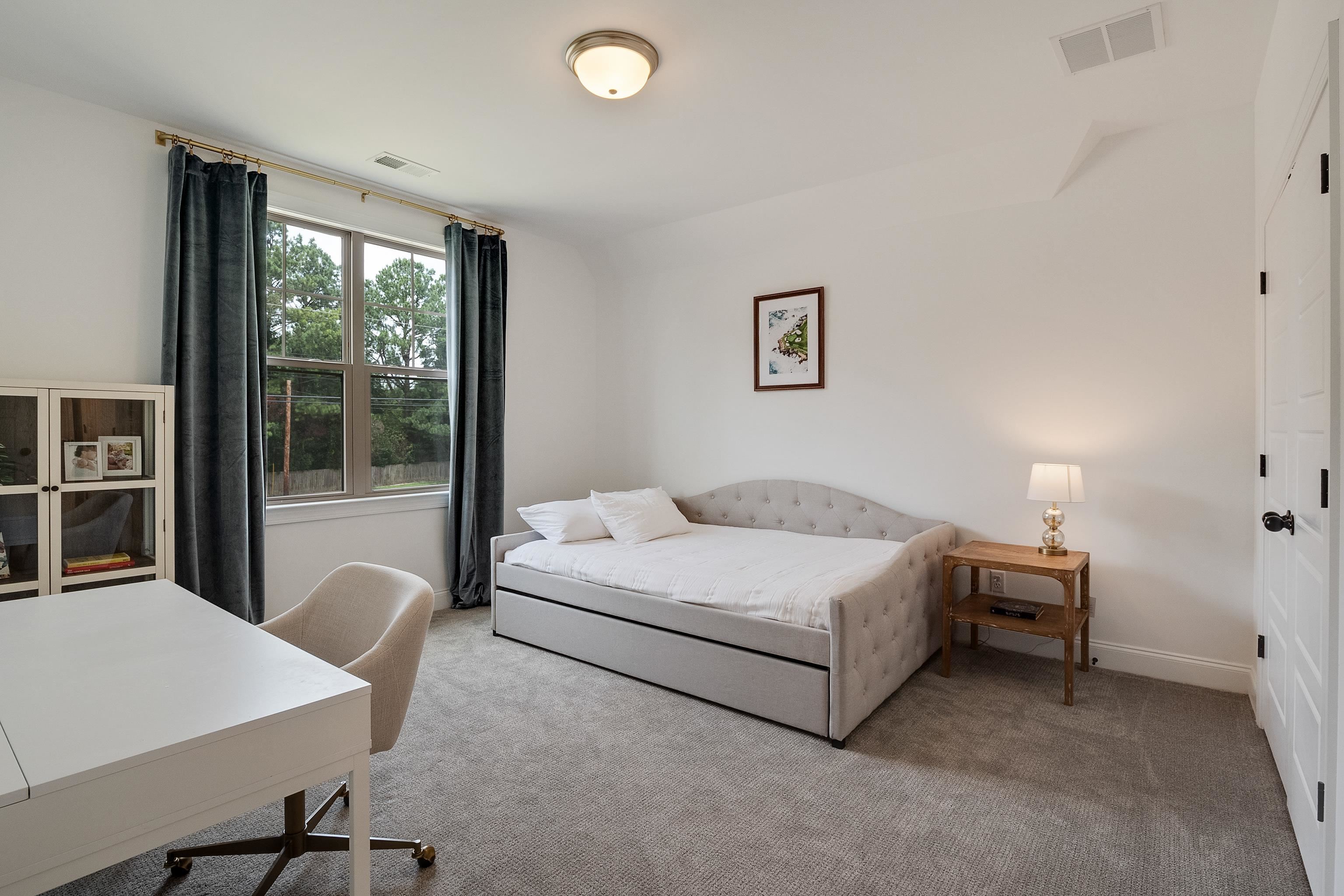 964 Collierville Arlington Road Collierville, TN 38017 - Photo 28 of 40 a bedroom with a bed and a large window