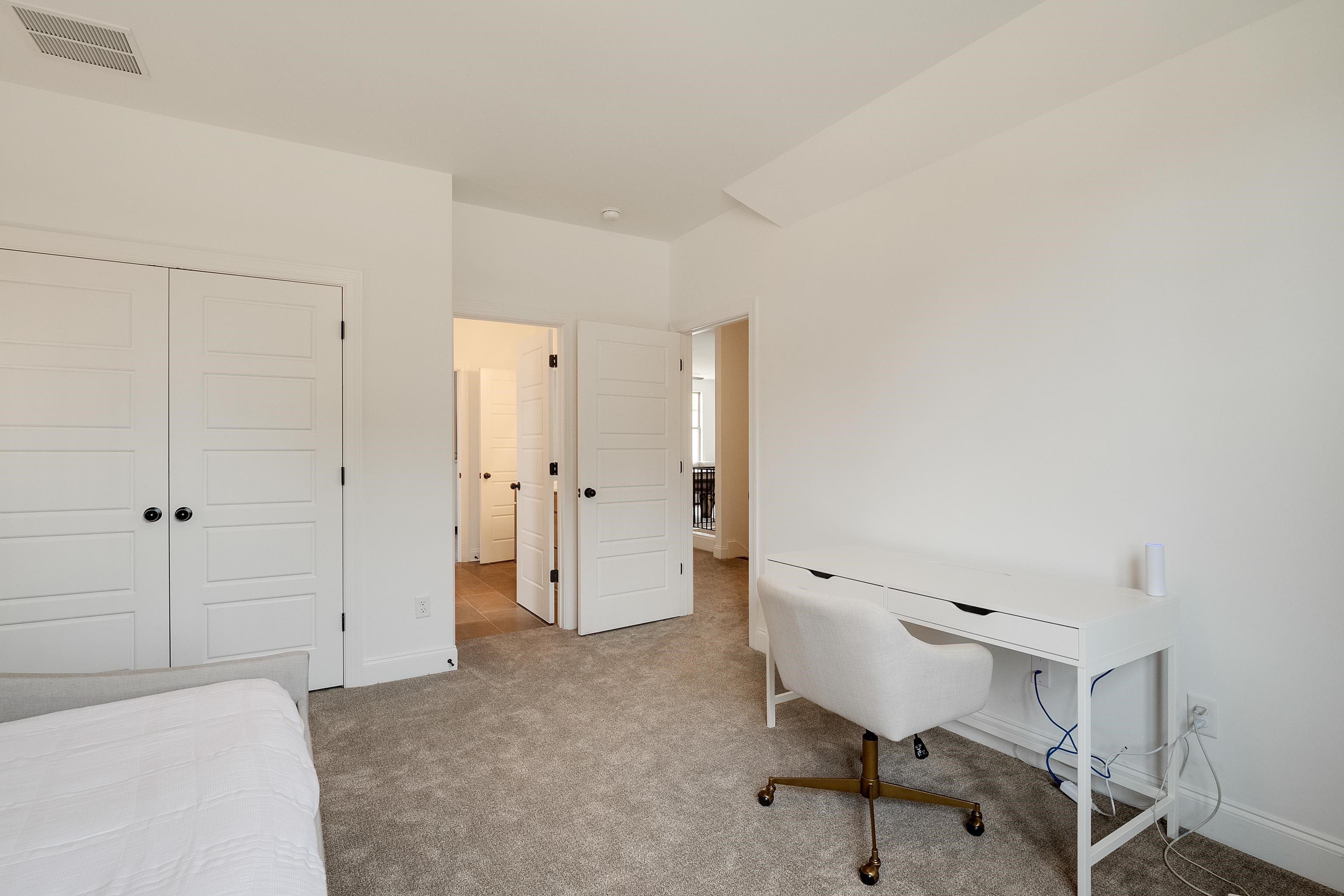 964 Collierville Arlington Road Collierville, TN 38017 - Photo 29 of 40 a view of a room with closet and a window