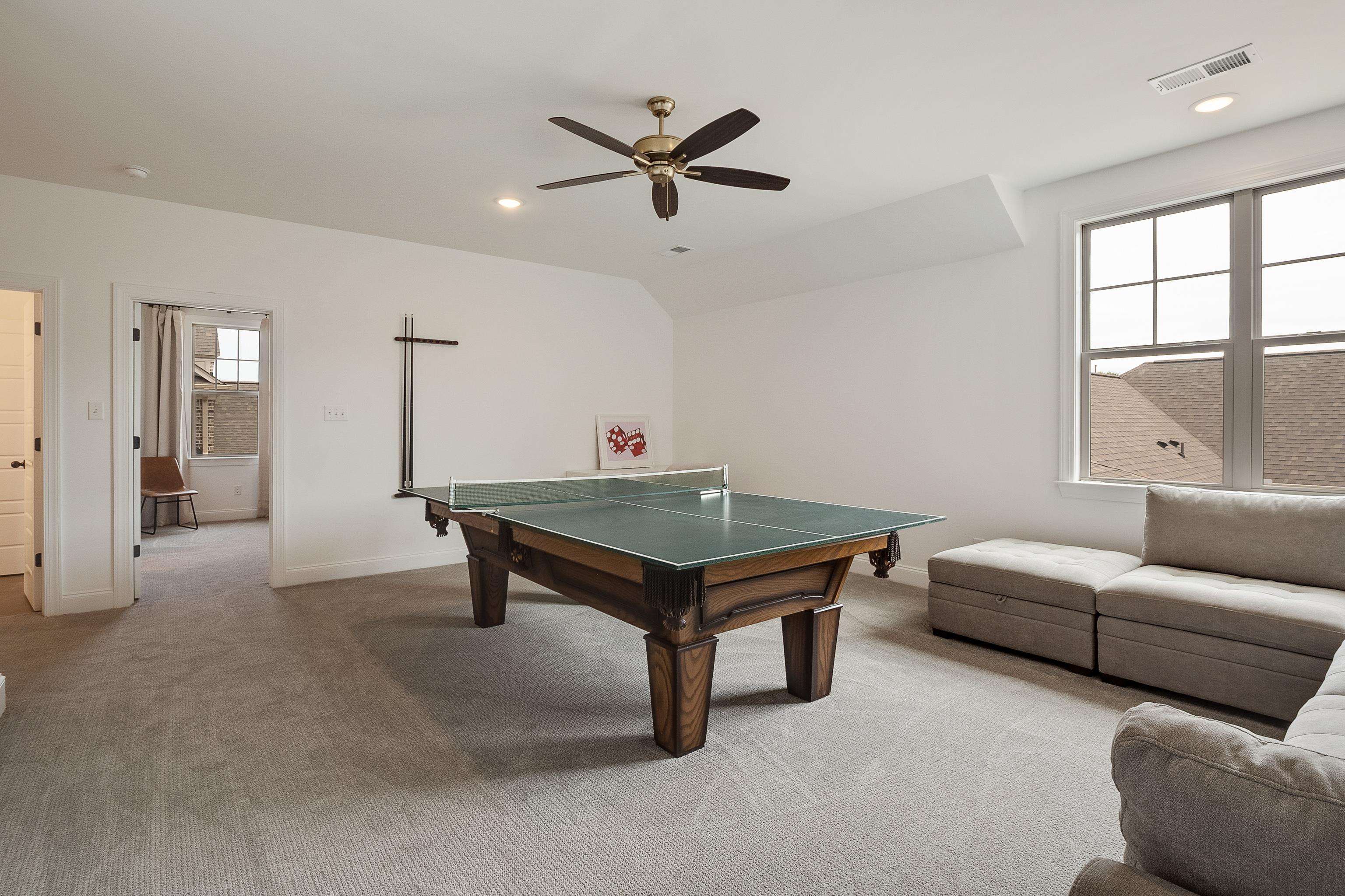 964 Collierville Arlington Road Collierville, TN 38017 - Photo 32 of 40 a living room with furniture a window and a ceiling fan