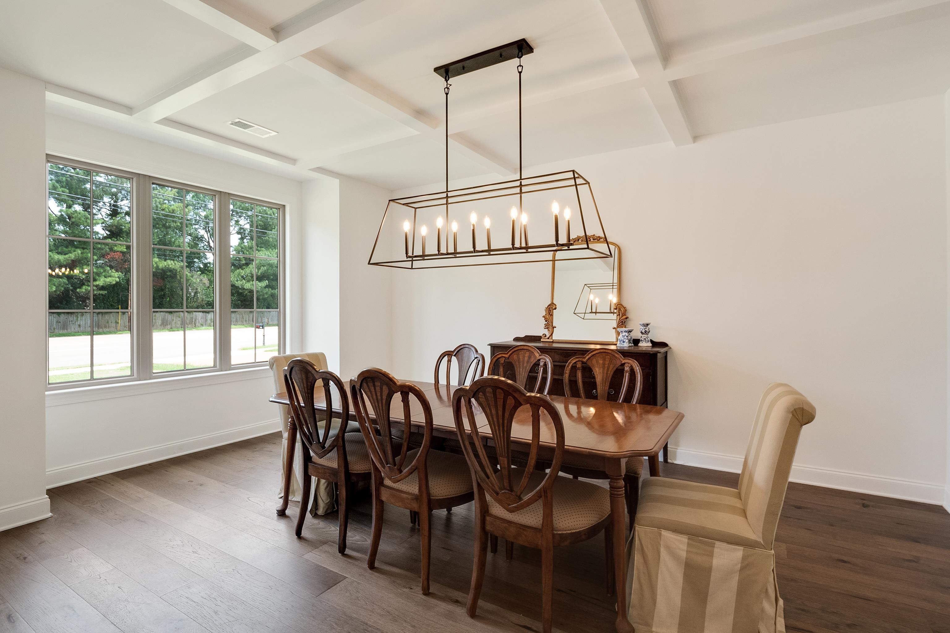 964 Collierville Arlington Road Collierville, TN 38017 - Photo 7 of 40 a view of a dining room with furniture window and wooden floor