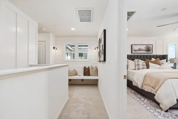 a bedroom with furniture and a couch