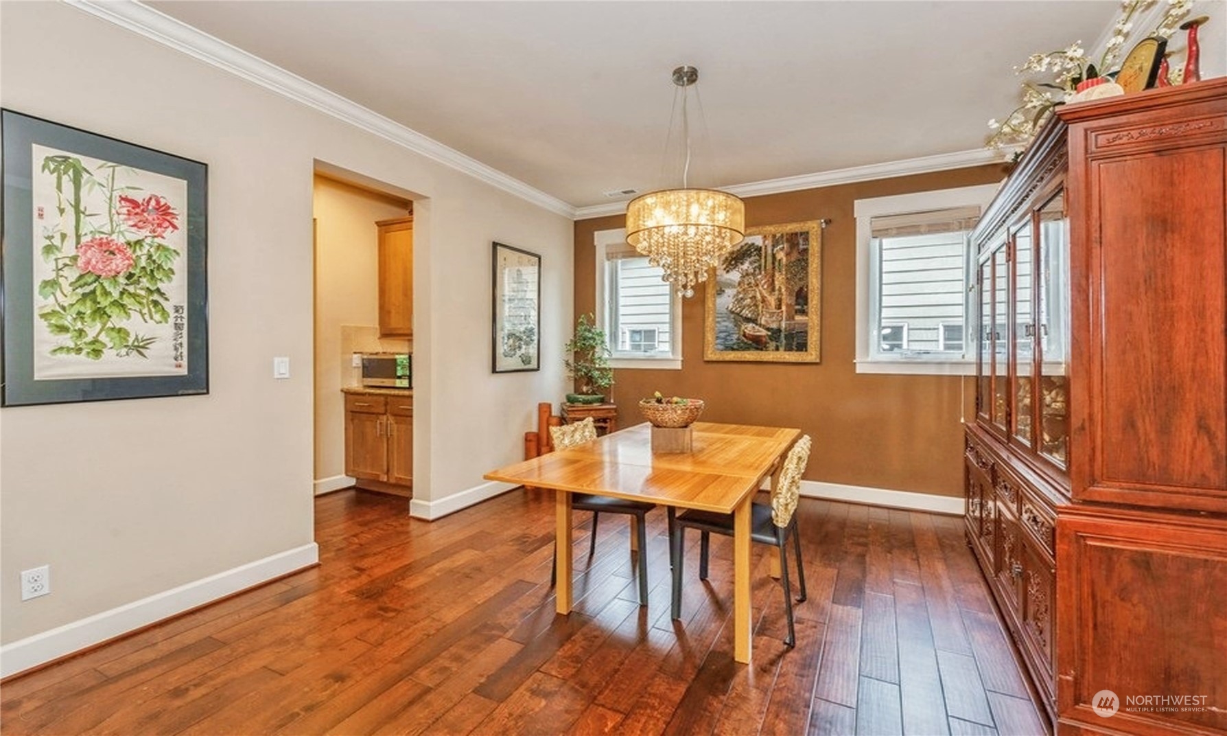 6219 Southeast 2nd Street Renton, WA 98059 - Photo 8 of 40 a view of a dining room with furniture windows and wooden floor