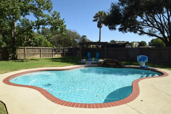 a view of outdoor space yard and swimming pool