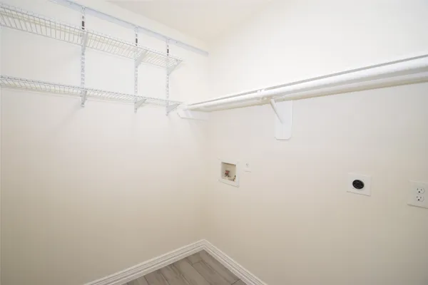 a view of a room with racks on the wall