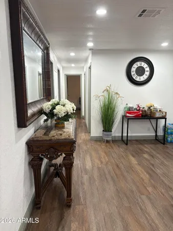 a view of a livingroom with furniture and window