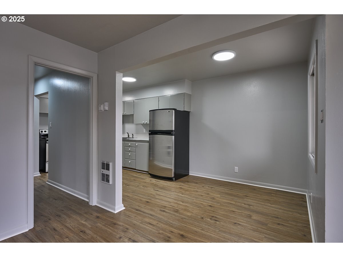 304 East Park Street Enterprise, OR 97828 - Photo 5 of 20 a view of empty room with wooden floor