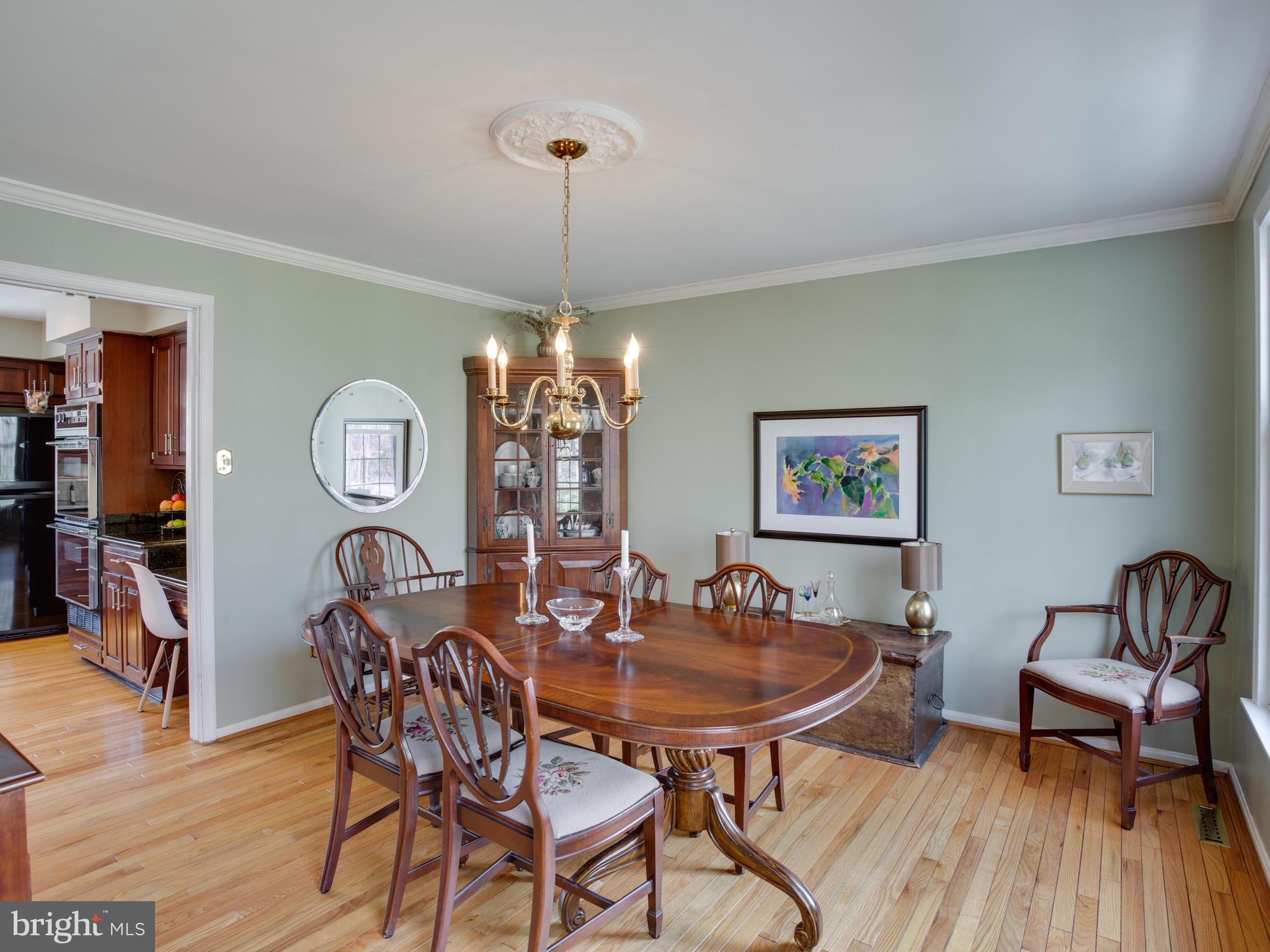 10400 3 Doctors Road Dunkirk, MD 20754 - Photo 14 of 60 Elegant Dining Room with Hardwood Floors.