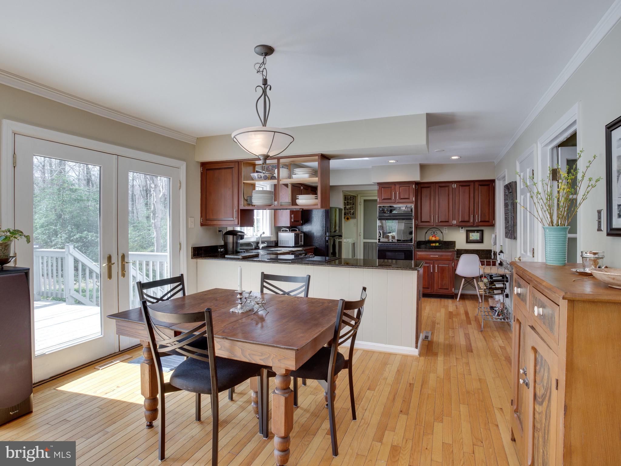10400 3 Doctors Road Dunkirk, MD 20754 - Photo 22 of 60 Eating area into Kitchen. Beautiful Hardwoods!