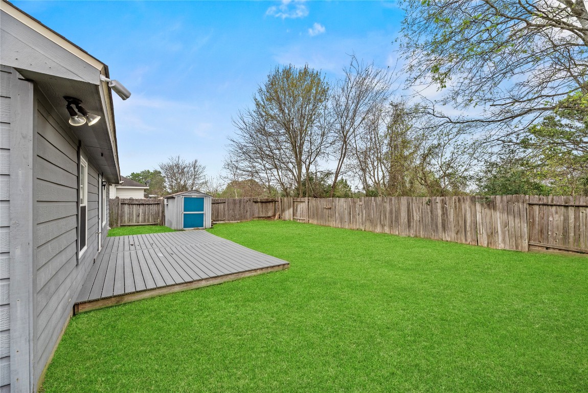 24006 Lazy Kay Lane Hockley, TX 77447 - Photo 19 of 21 a view of a yard with a house