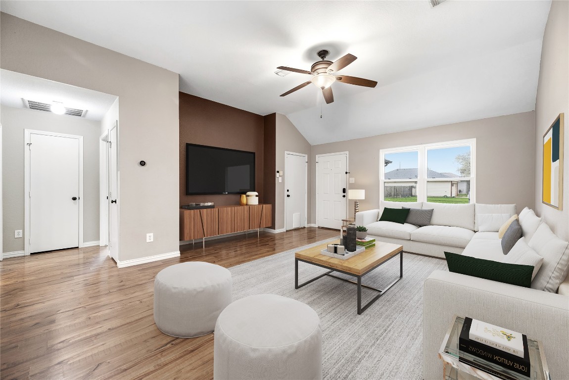 24006 Lazy Kay Lane Hockley, TX 77447 - Photo 3 of 21 a living room with furniture and a flat screen tv