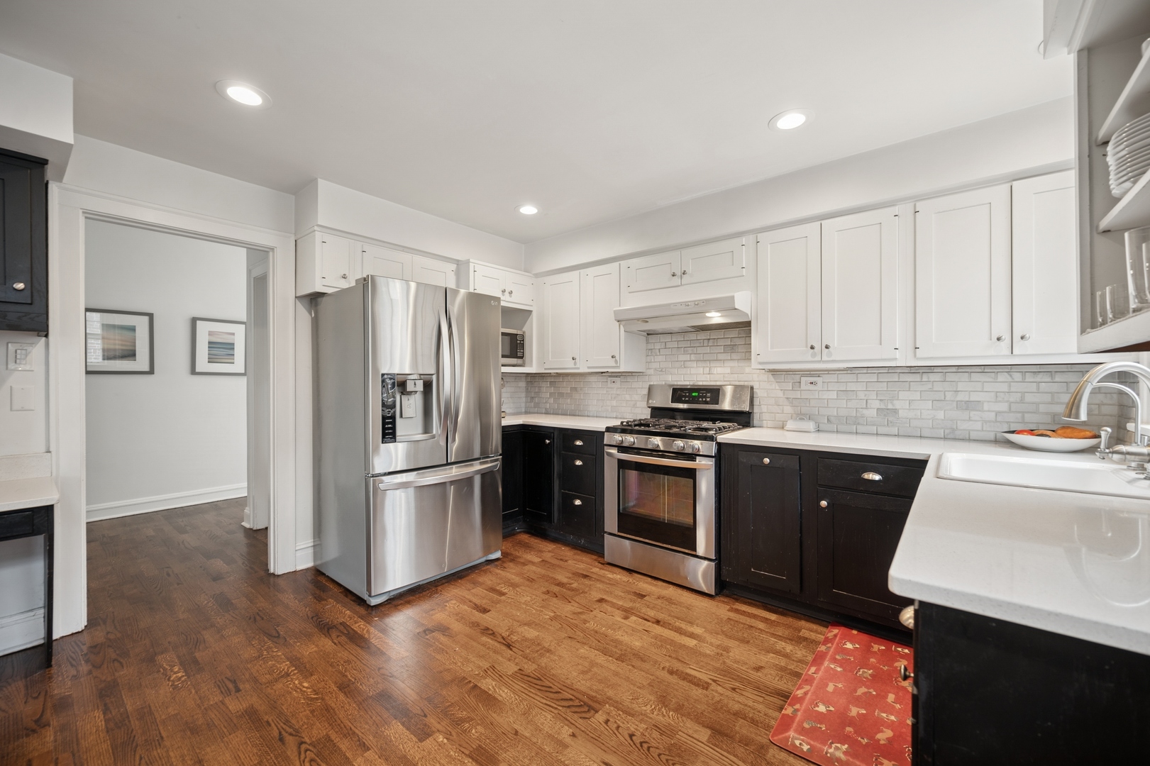 2145 Chestnut Avenue Wilmette, IL 60091 - Photo 14 of 38 a kitchen with a refrigerator stove top oven and sink