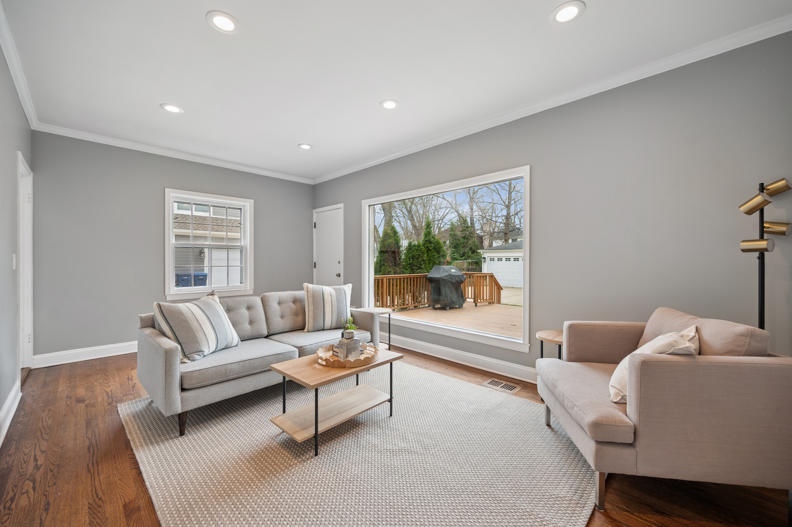 2145 Chestnut Avenue Wilmette, IL 60091 - Photo 16 of 38 a living room with a couch and a large window