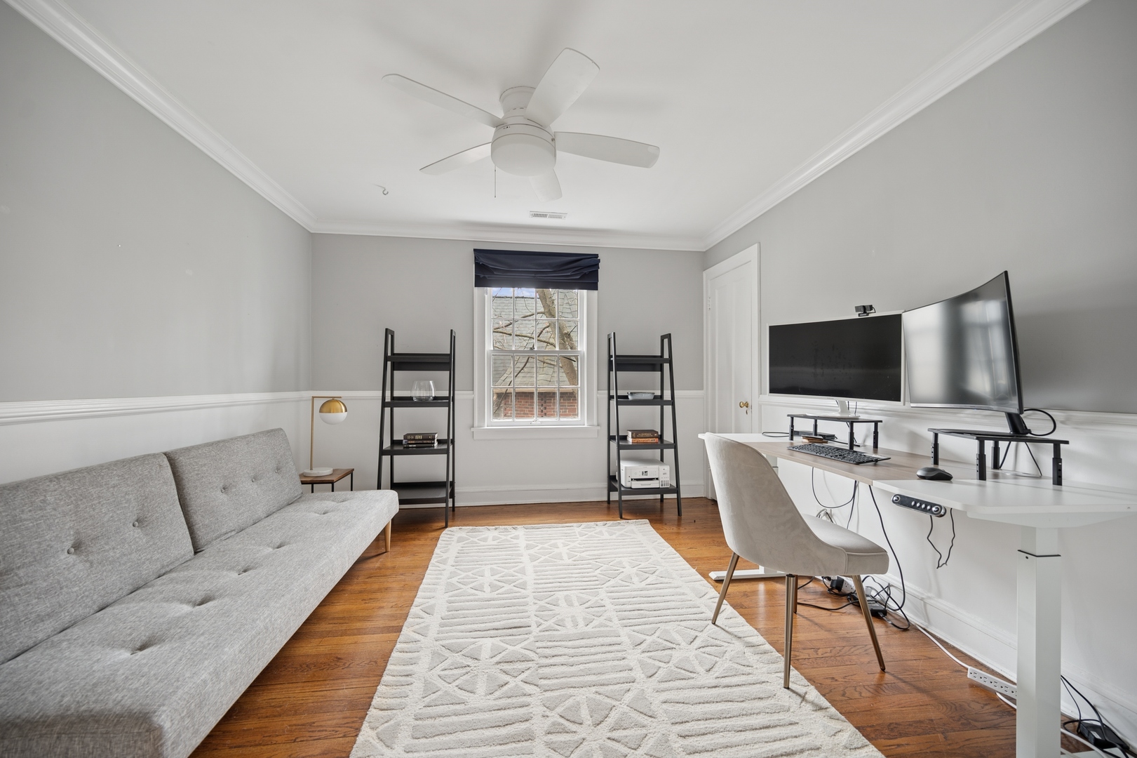 2145 Chestnut Avenue Wilmette, IL 60091 - Photo 25 of 38 a living room with furniture and a flat screen tv