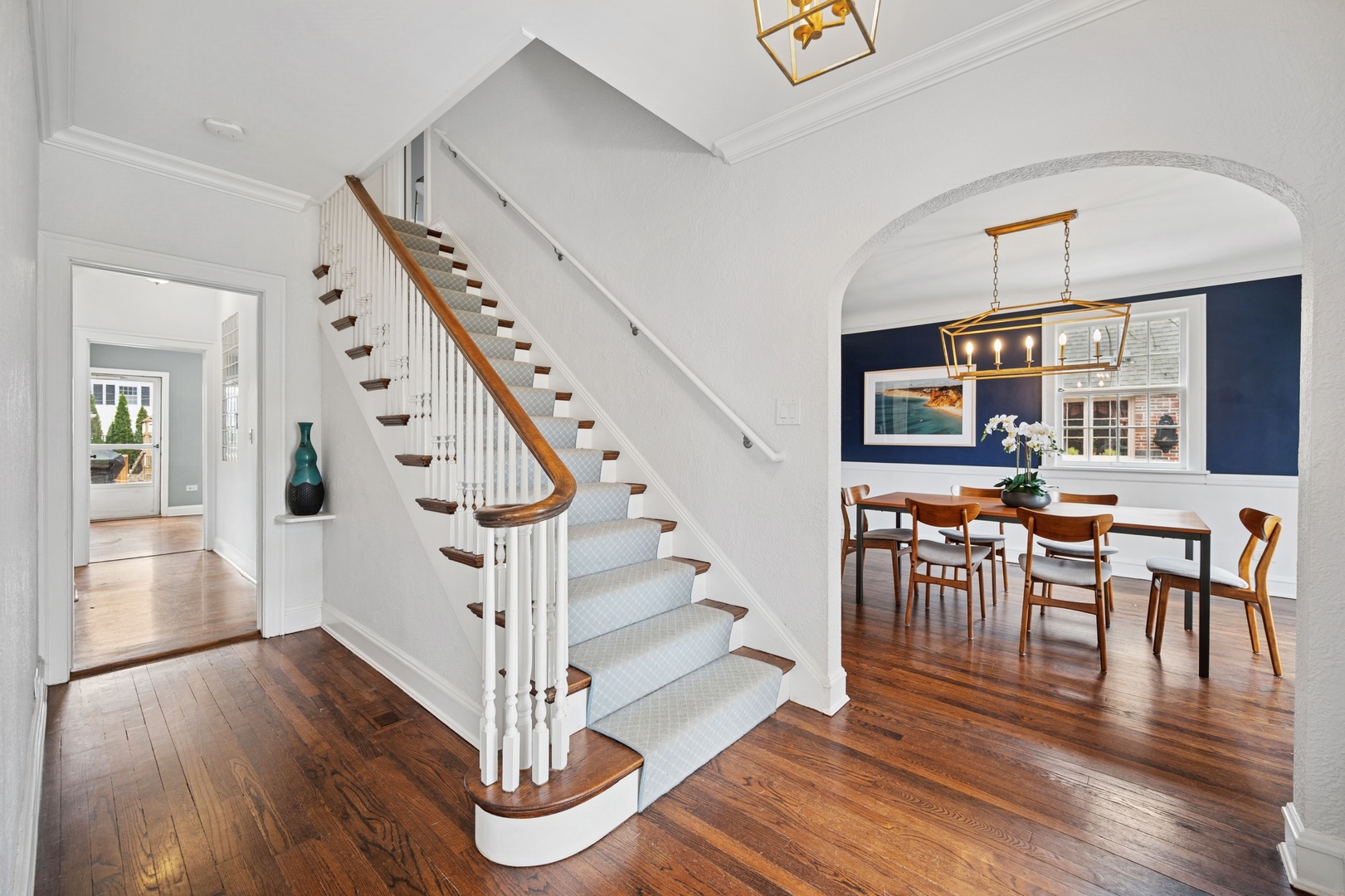 2145 Chestnut Avenue Wilmette, IL 60091 - Photo 3 of 38 a view of entryway with dining room and wooden floor