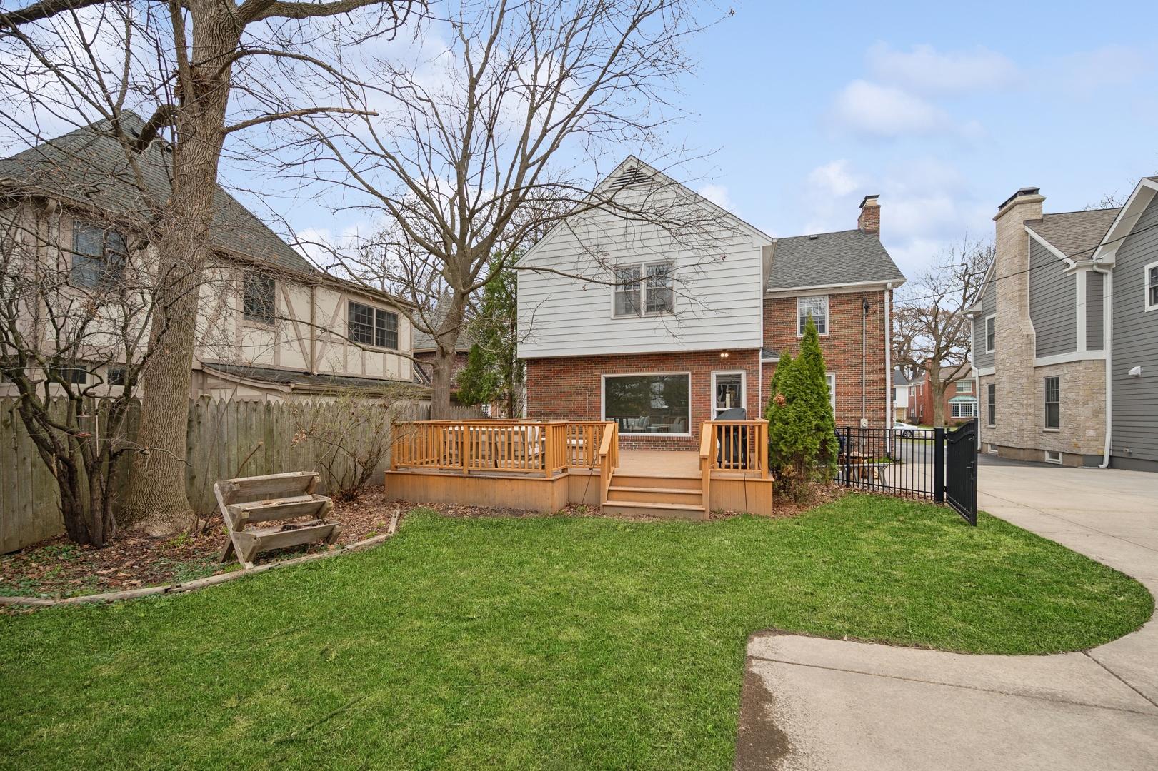 2145 Chestnut Avenue Wilmette, IL 60091 - Photo 32 of 38 a view of a house with a yard and sitting area