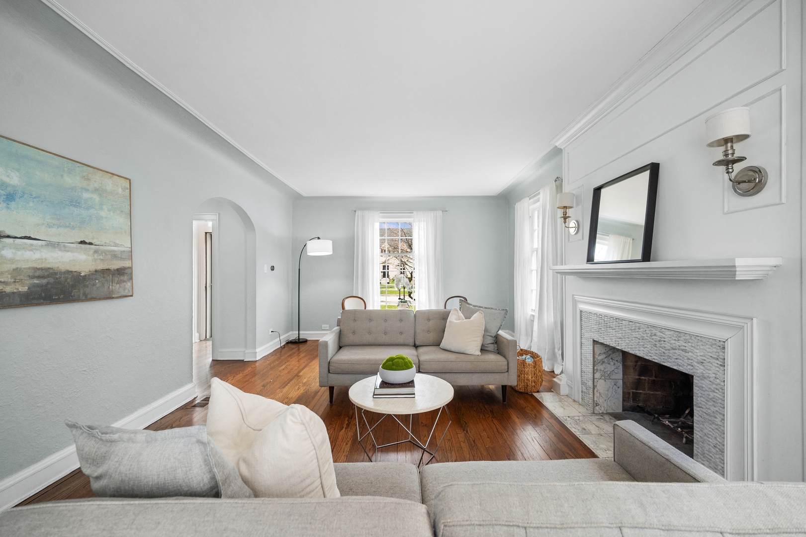 2145 Chestnut Avenue Wilmette, IL 60091 - Photo 7 of 38 a living room with furniture and a fireplace