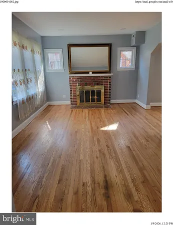 a view of a livingroom with furniture and window