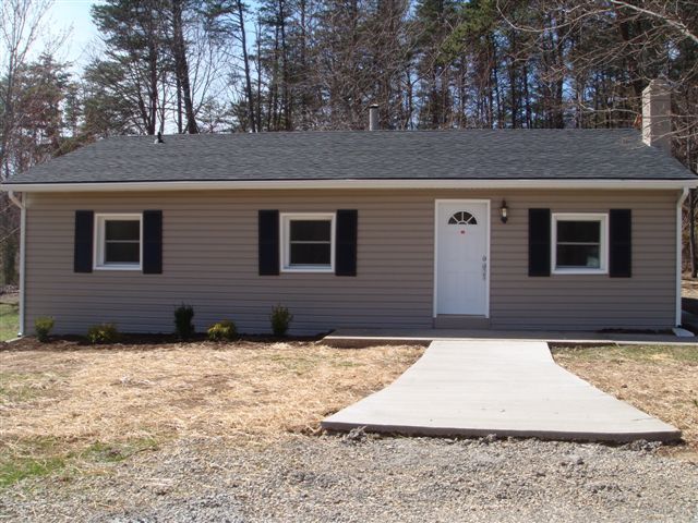 5111 Lewis Road Roanoke, VA 24014 - Photo 1 of 12 a backyard of a house
