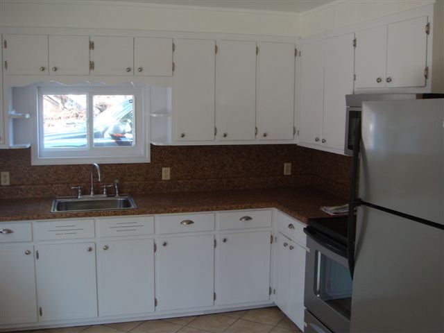 5111 Lewis Road Roanoke, VA 24014 - Photo 3 of 12 a view of cabinets and window