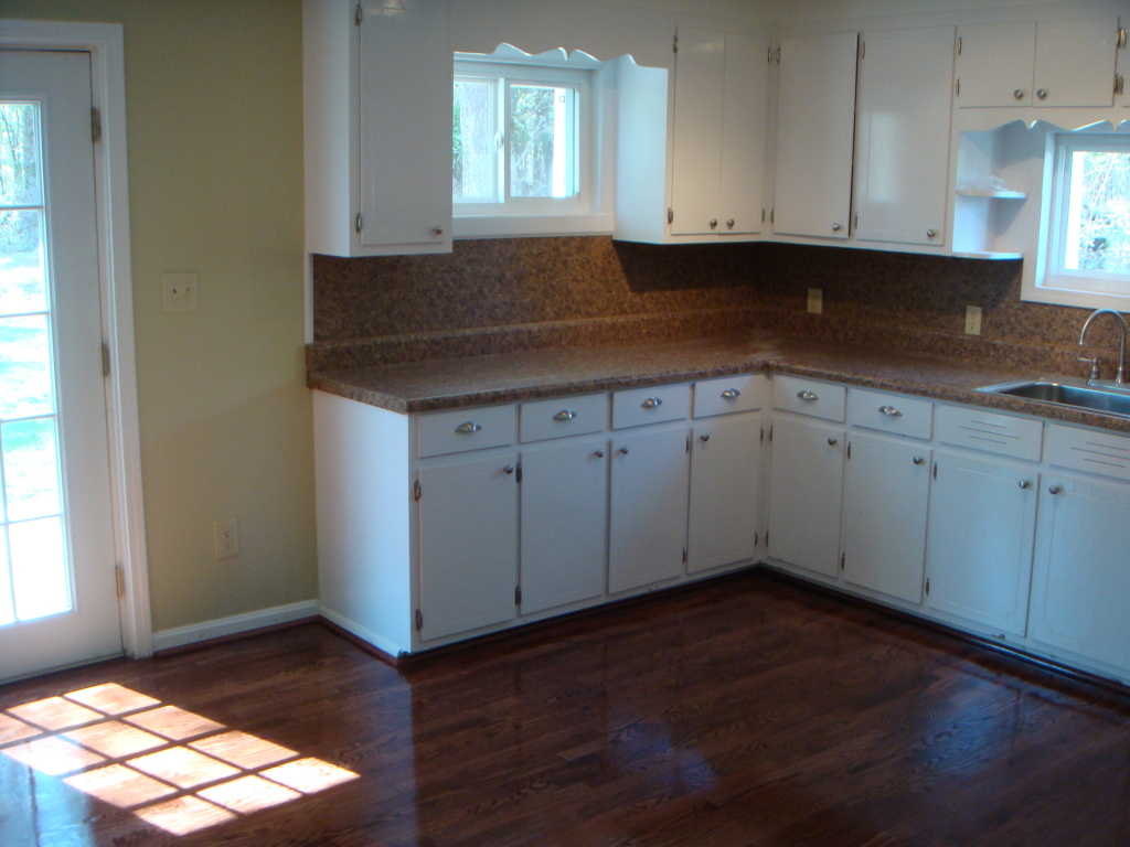 5111 Lewis Road Roanoke, VA 24014 - Photo 4 of 12 a kitchen with granite countertop cabinets and window